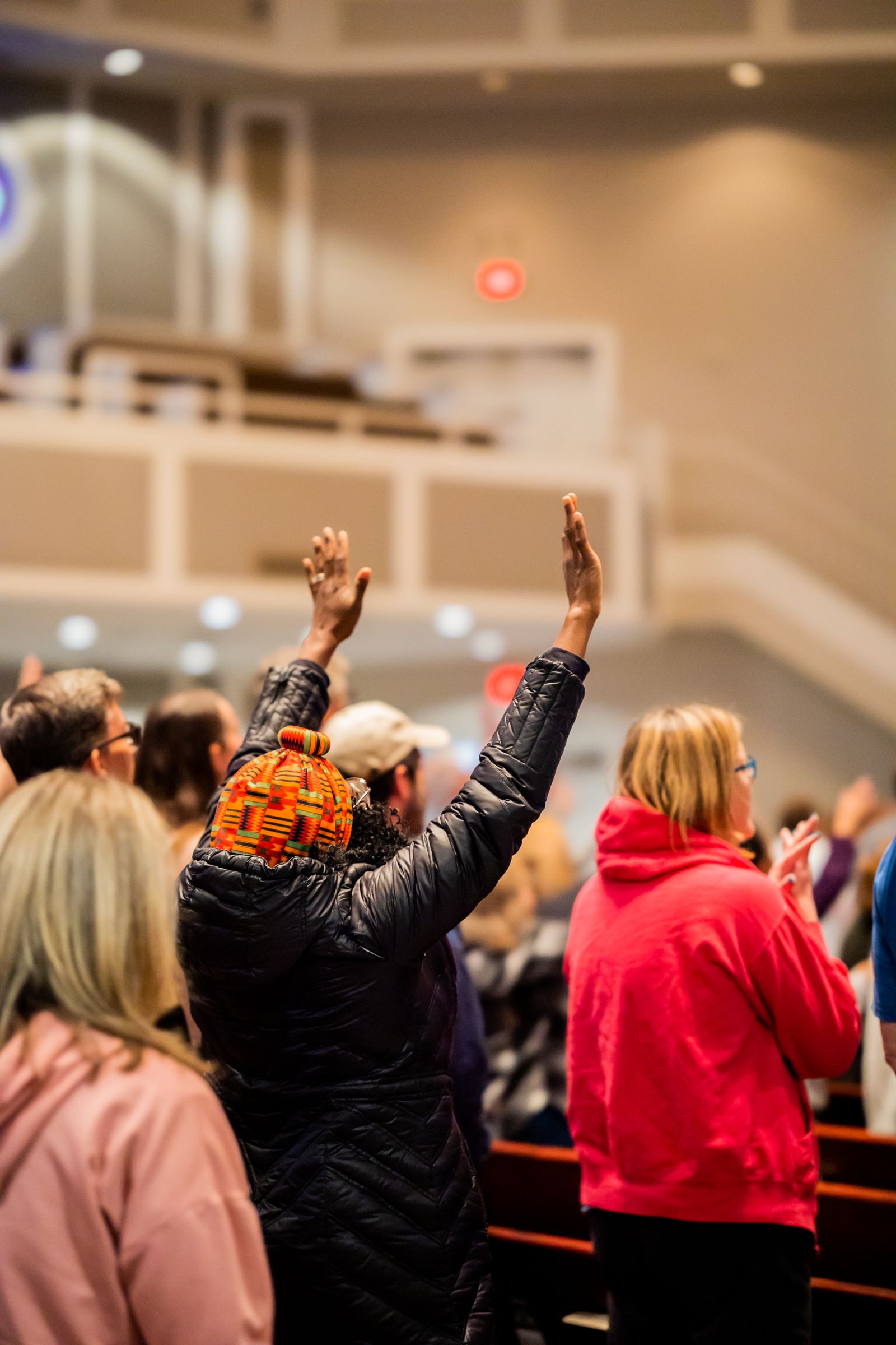 A congregation participates together during a church worship service.