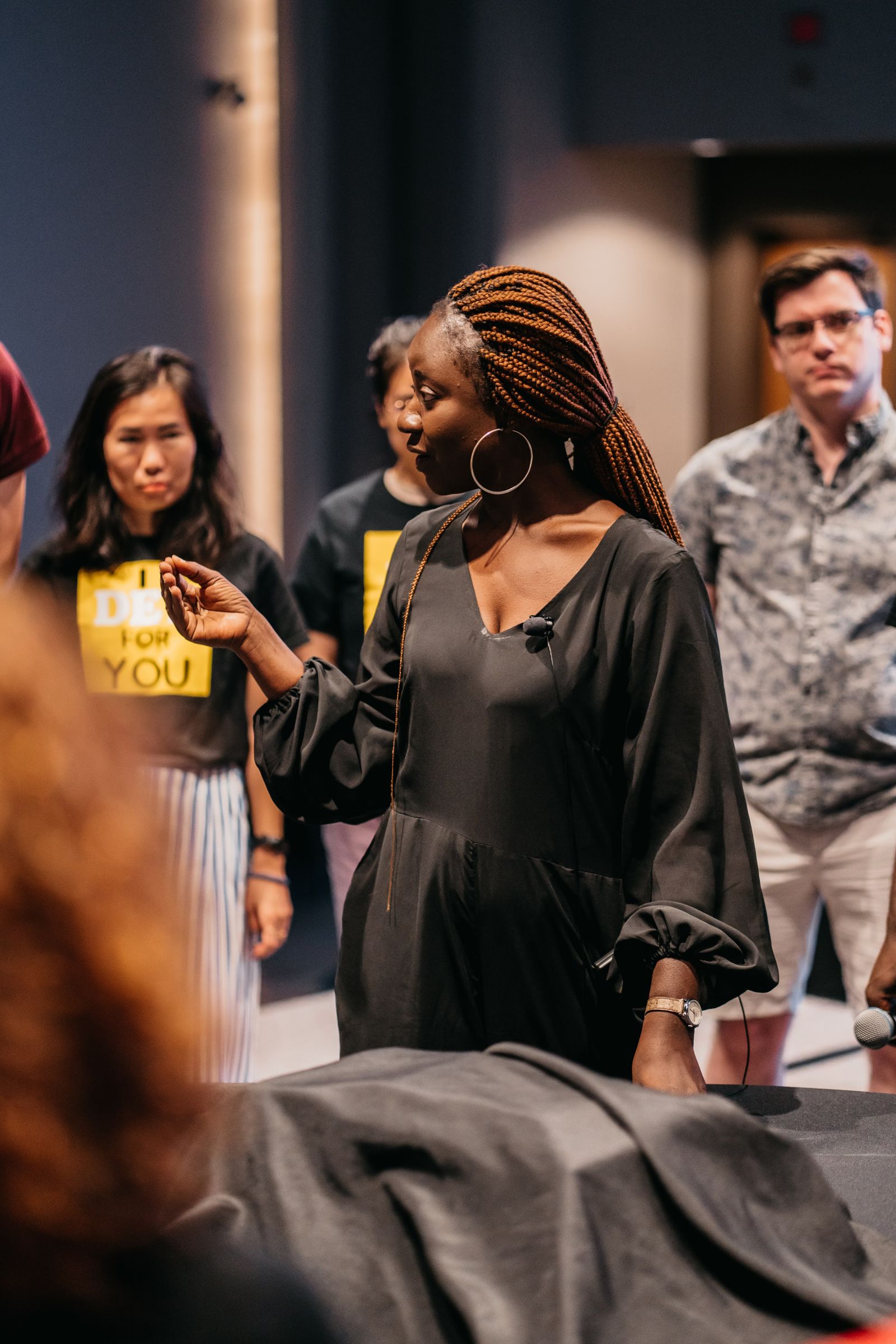 Adults participate together during an engaging indoor workshop.