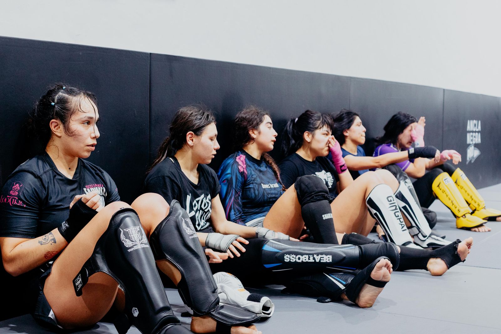 Women participate in a supervised physical skills training session.